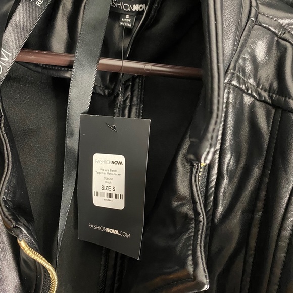 Faux leather coat with faux fur sleeves. - Picture 3 of 6